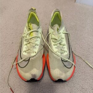 Alpha Fly 1…Nike Women's Running Shoes in Light Cream, Neon Yellow & Orange